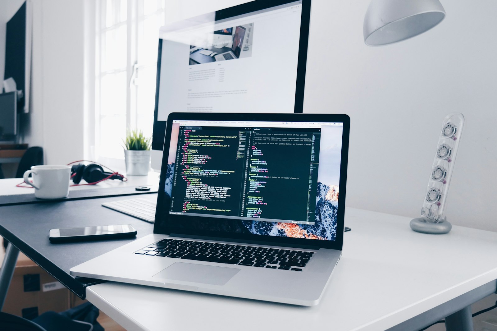 Software development at RSK Industries, code on screen